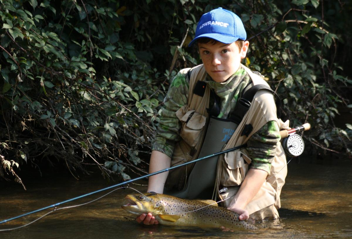 Dec 1 streams Ben Todd with a brown trout. 0