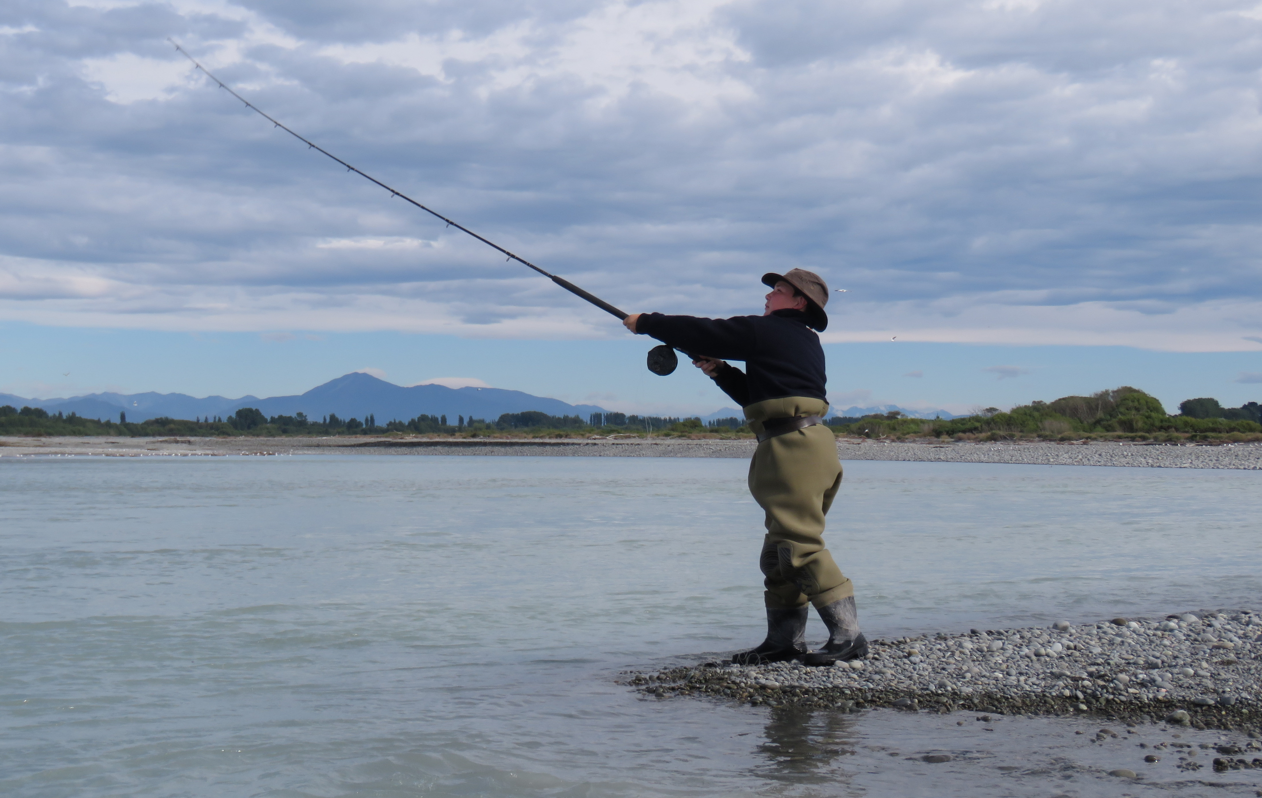 WFR2122.39 Ben Chivers tries his luck for a sea run salmon at the Rangitata River during the 21 22 summer holidays credit Rhys Adams