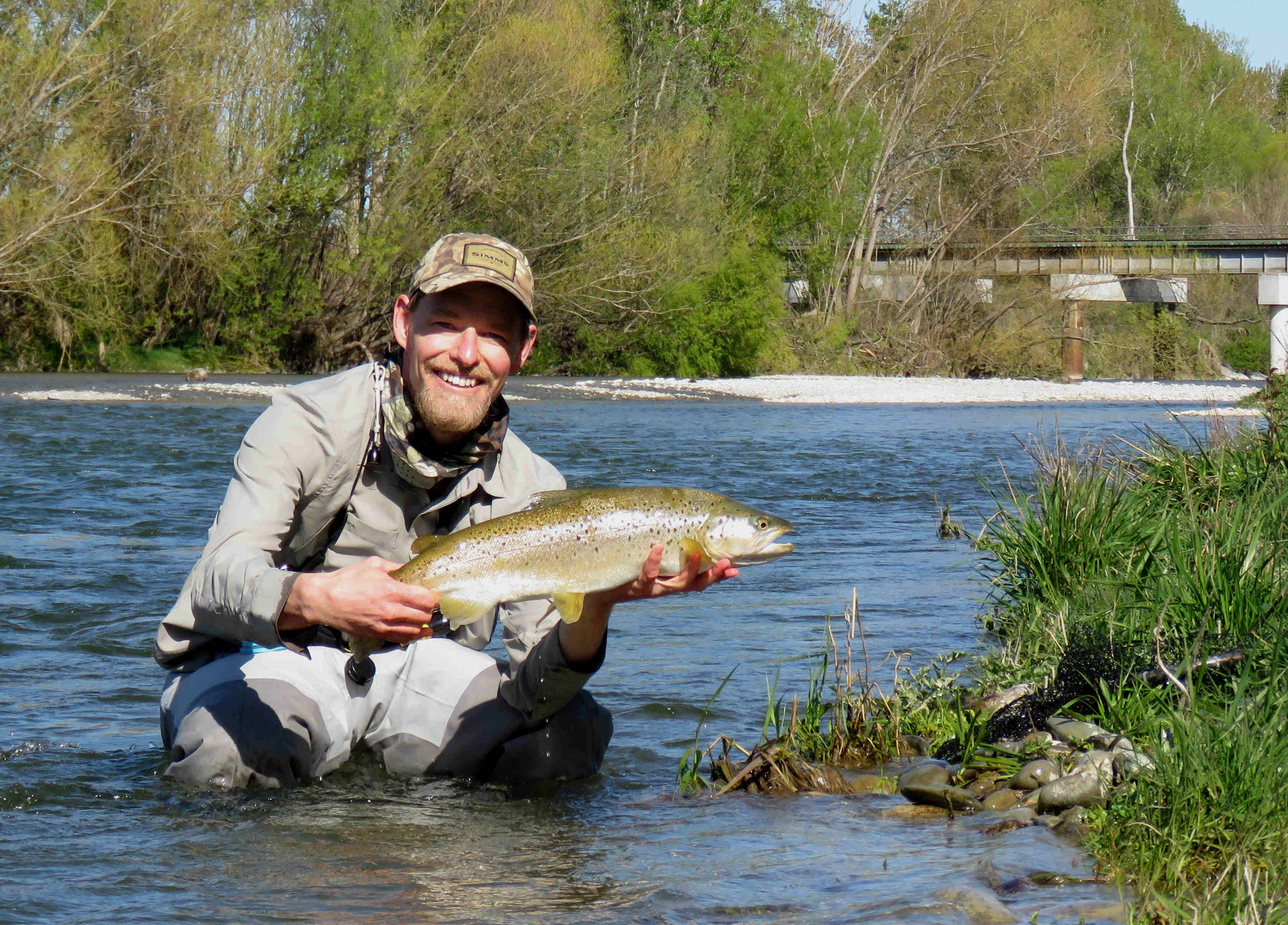 RL Sept22 CSI 2 Rhys Adams with a large brown trout caught at the Opihi Riveron Opening Day 2021