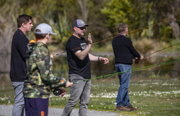 Presenter Mark Rodgers, (centre) from the Fisherman's Loft giving casting advice to an attendee during one of the outside practical sessions held at the Groynes Lakes.