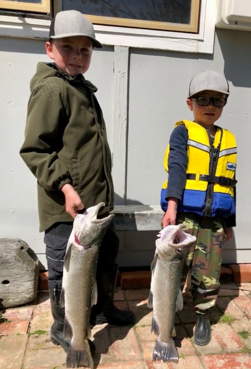 Thomas and Archie van Dongen with their big brown trout from the Rangitata River' photo by M Hall