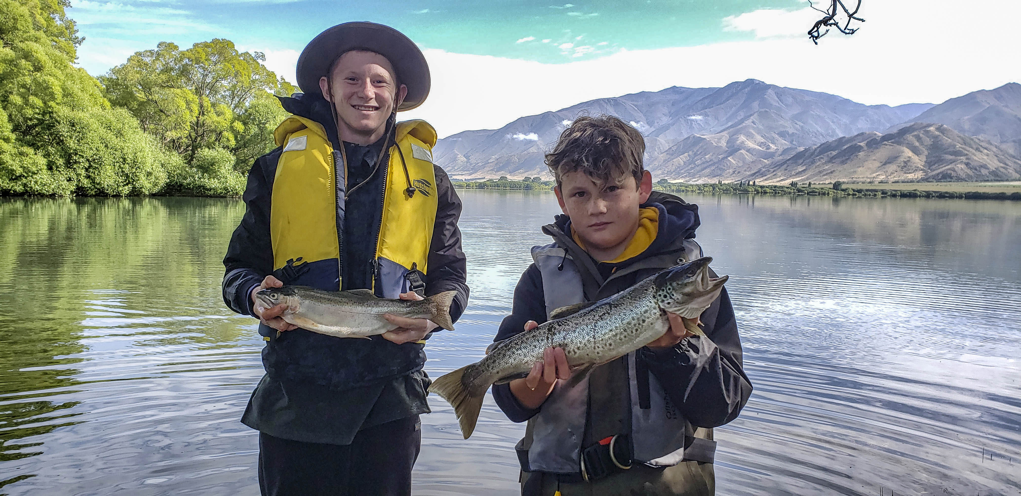 WFR1920.41 Marcus Isitt and Harper Robinson with the pick of their mornings catch at Lake Benmore 1